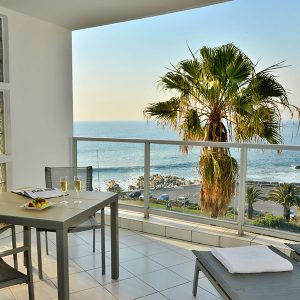 The Peninsula All-Suite Hotel balcony with the view of the ocean