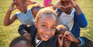 kids smiling and posing for an image