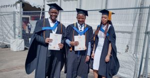 3 students graduating