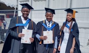 3 students graduating