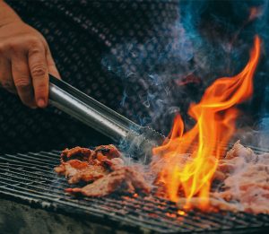barbecue - busy braaiing meat